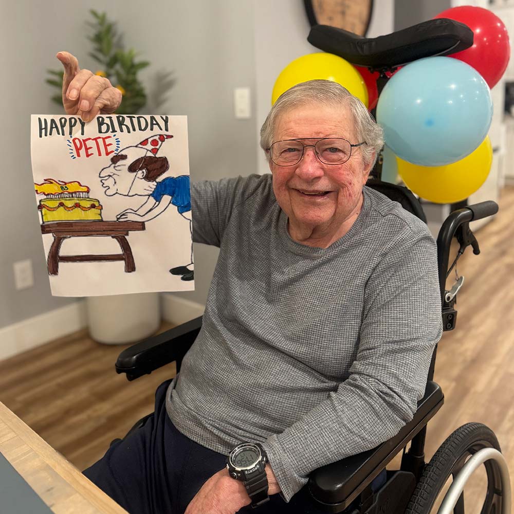 A resident celebrating a personalized birthday milestone at Cherry Creek Adult Family Home in Kennewick, highlighting the joyful, individual attention and community spirit in our 24-hour residential care. A resident celebrating a personalized birthday milestone at Cherry Creek Adult Family Home in Kennewick, highlighting the joyful, individual attention and community spirit in our 24-hour residential care.